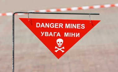 Warning sign on mined area clipart