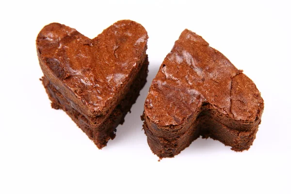 Two heart shaped slices of a brownie — Stock Photo, Image