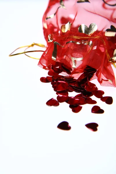 Bag with heart shaped confetti — Stok fotoğraf