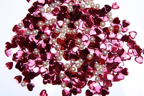 Confetti e perle a forma di cuore — Foto Stock