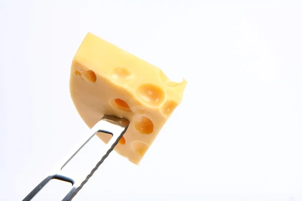 Cheese on a knife — Stock Photo, Image