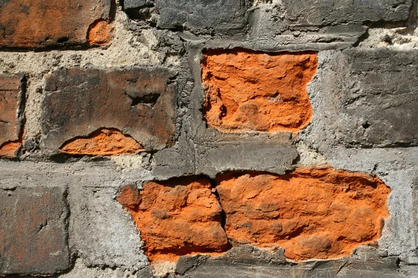Una pared de ladrillo — Foto de Stock