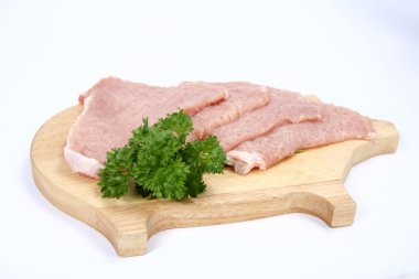 Raw tenderized pork chops clipart