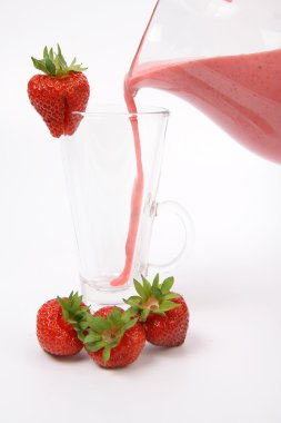 Strawberry shake being poured into a glass clipart