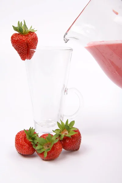 Strawberry shake being poured into — Stock Photo, Image