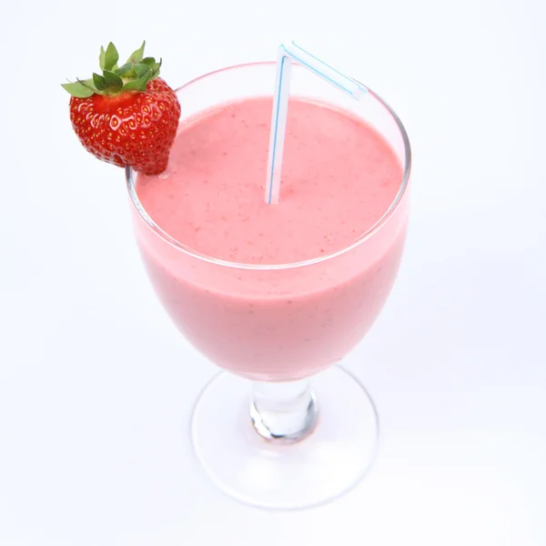 Strawberry shake in a glass with a straw — Stock Photo, Image