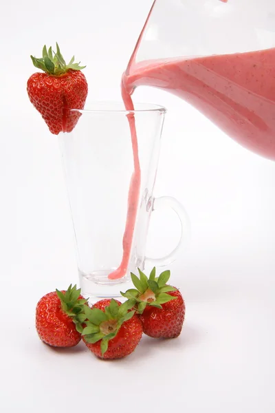 stock image Strawberry shake being poured into a glass