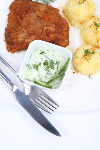 Pork chop, potatoes, cucumber salad — Stockfoto