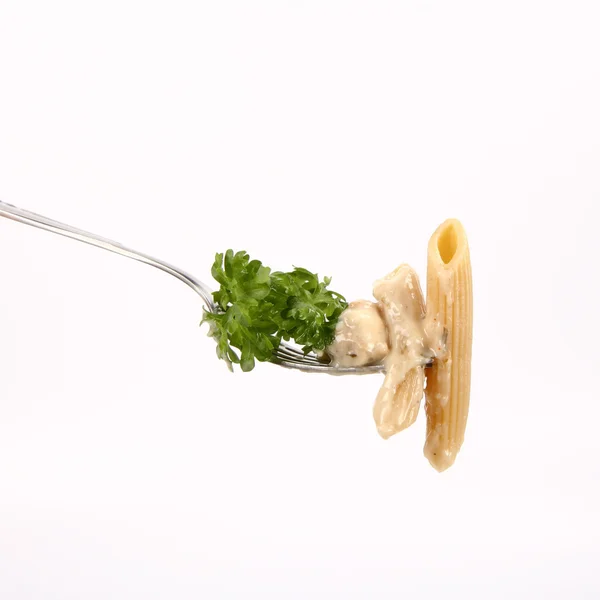 stock image Penne with white sauce on a fork