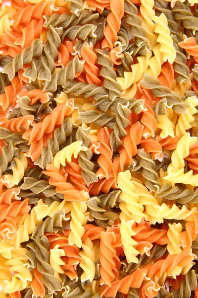 stock image Raw colorful fusilli pasta