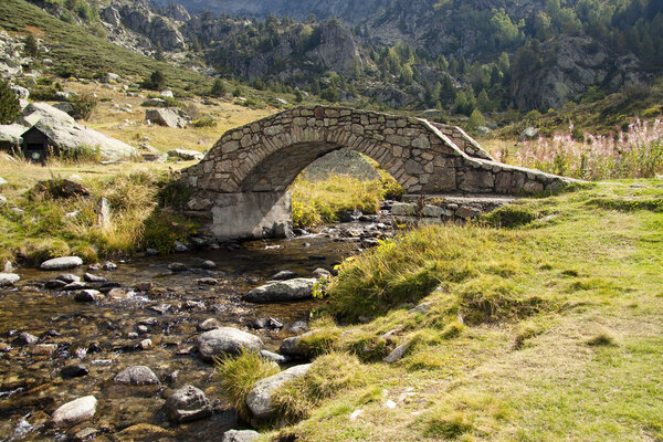 Stone bridge over river