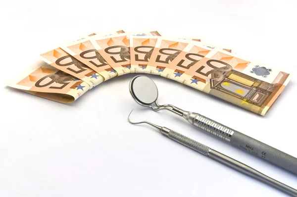 Money and dental care Royalty Free Stock Images