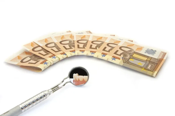 Peníze a zubní péče Stock Obrázky