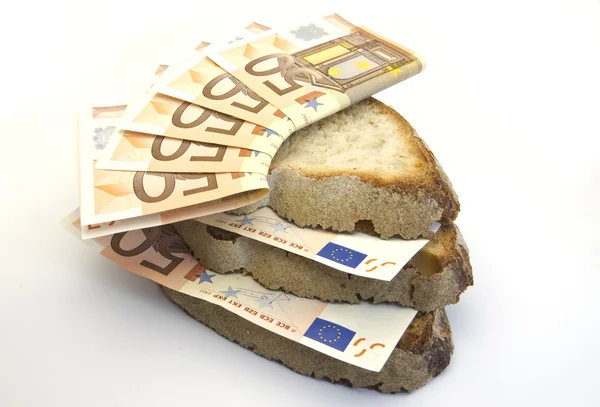 Chleb i pieniądze Zdjęcie Stockowe
