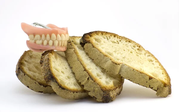 Quien tiene pan no tiene dientes — Foto de Stock