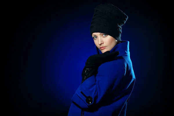 Lady in a blue topcoat — Stock Photo, Image