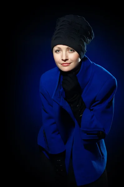 Lady in a blue topcoat — Stock Photo, Image