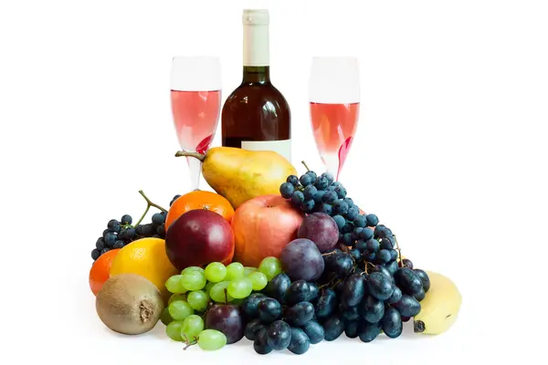 Fruits, bottle of wine and glasses Stock Picture
