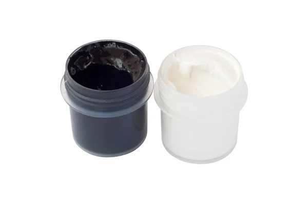 Jars with black and white gouache — Stock Photo, Image