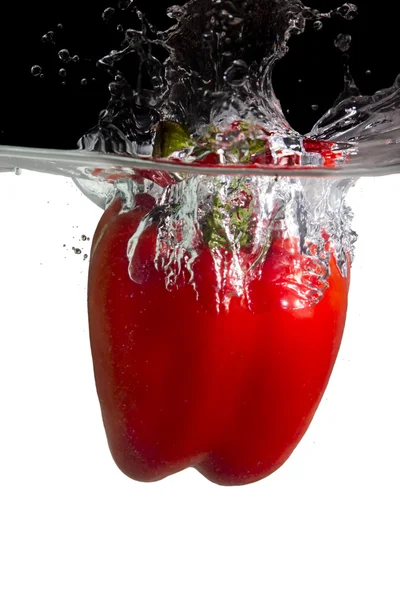 Paprika in water — Stockfoto