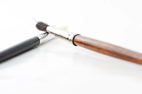 Two brushes to back — Stock Photo, Image