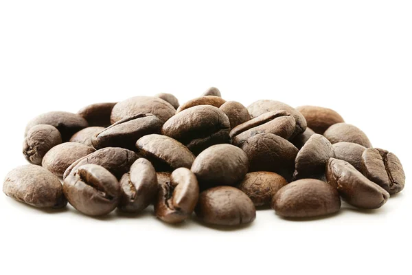 Někteří kávová zrna — Stock fotografie