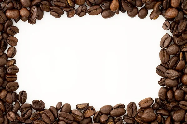 Witte omgeven koffie bonen — Stockfoto
