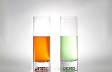 Two glasses with liquids clipart