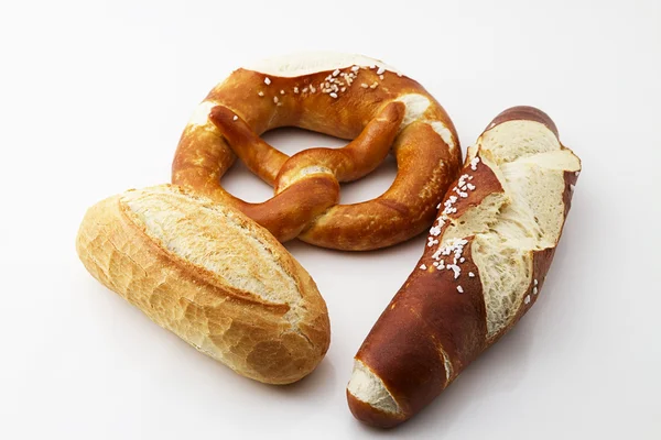 Rollo de pretzel y algún tipo de pretzel —  Fotos de Stock