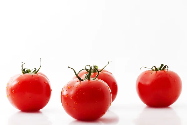 Une tomate et trois — Photo