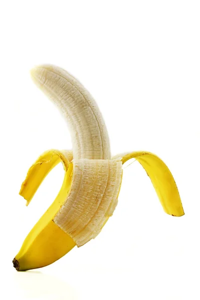 Banán loupaný stojící — Stock fotografie