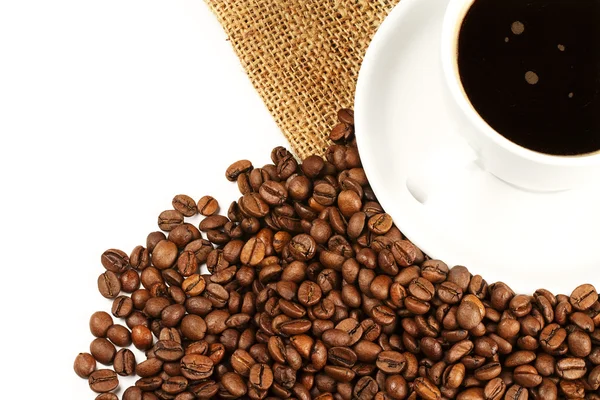 Koffiekopje van top met jute en bonen — Stockfoto