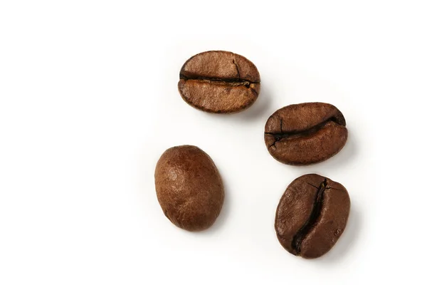 Quatre grains de café de haut — Photo