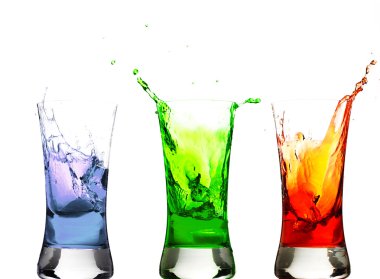 Ice cubes in coloreful row of glasses clipart