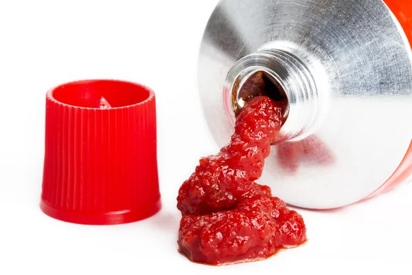 Tomato puree out of a tube — Stock Photo, Image