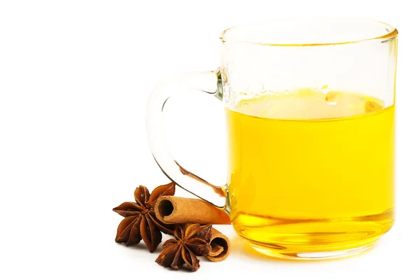 Yellow tea with cinnamon sticks and star anise — Stock Photo, Image