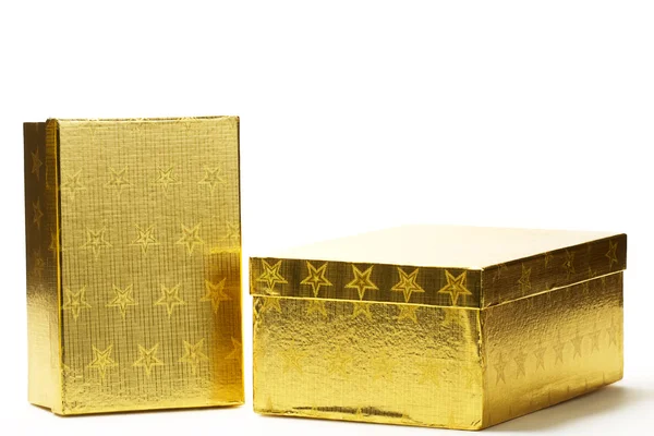 Zwei verschlossene goldene Geschenkboxen — Stockfoto