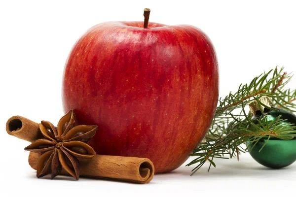 Apple anise cinnamon green christmas ball and a branch — Stock Photo, Image