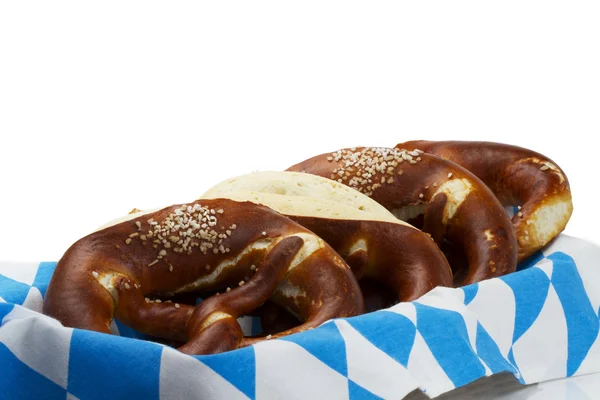 Some pretzels in a bread basket — Stok fotoğraf