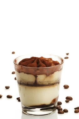 Tiramisu in a glass with coffee beans clipart