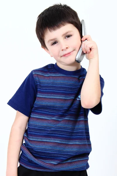 Lille dreng opkald fra mobiltelefon - Stock-foto