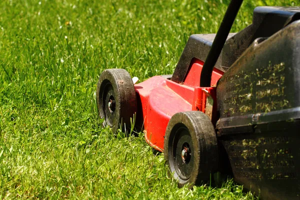 Lawnmower on grass — Stock Photo, Image