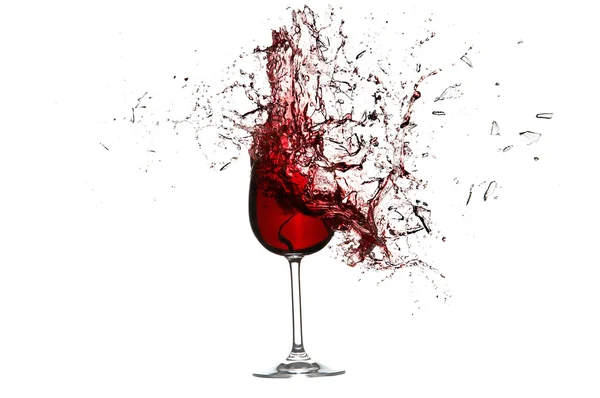 Η έκρηξη του ένα ποτήρι με το κόκκινο κρασί που απομονώνονται σε λευκό. XXL. — Φωτογραφία Αρχείου