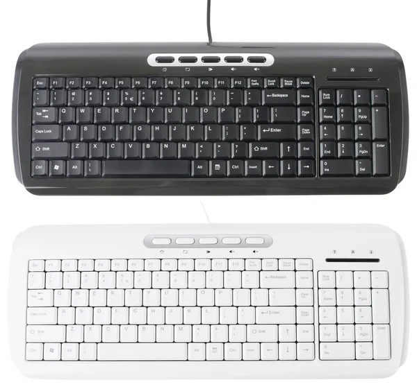 White and Black Keyboards isolated with clipping path over white — Stock Photo, Image