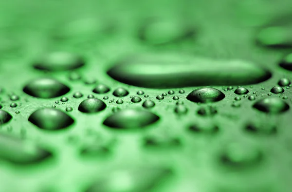 Vattendroppar bildas från kondens inuti metallföremål gree — Stockfoto