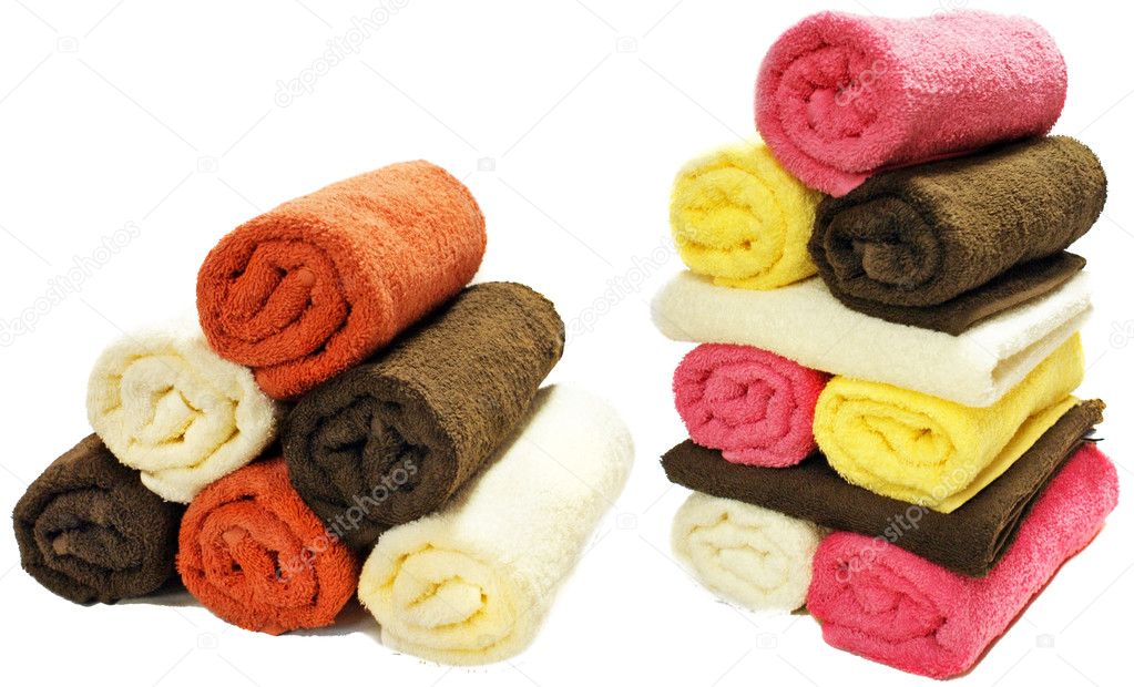 Multicolour towels rolls isolated on white background