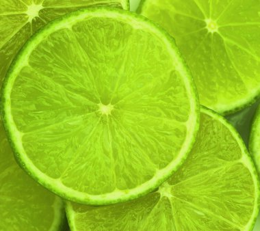 Lime slices abstract food background clipart