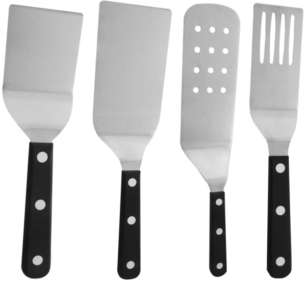 Ensemble de quatre tours, spatule, truelle d'ustensile pour cuisinier isolé — Photo