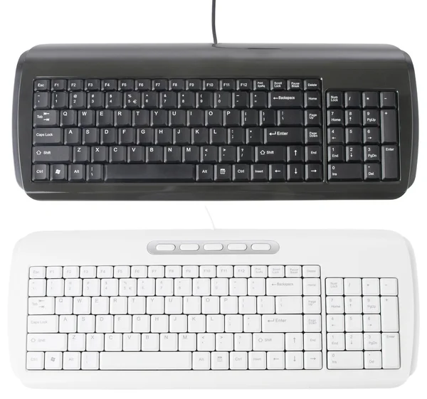 White and Black Keyboards isolated with clipping path over white — Stock Photo, Image