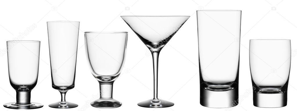 Set of empty cocktail glasses isolated on white background with